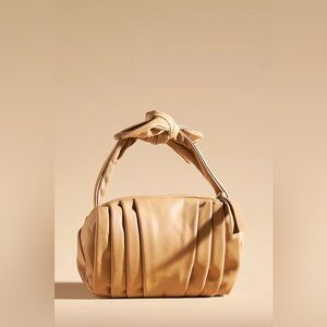 Mini Top-Knot Pleated Leather Handbag
By Anthropologie